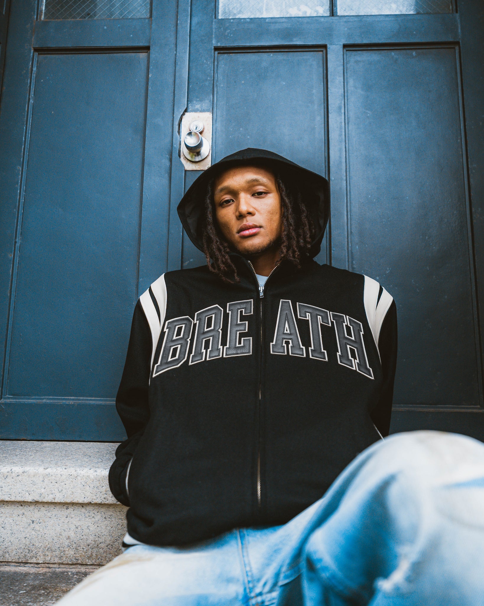 ARCH LOGO HOODED VARSITY JACKET / BLACK WHITE