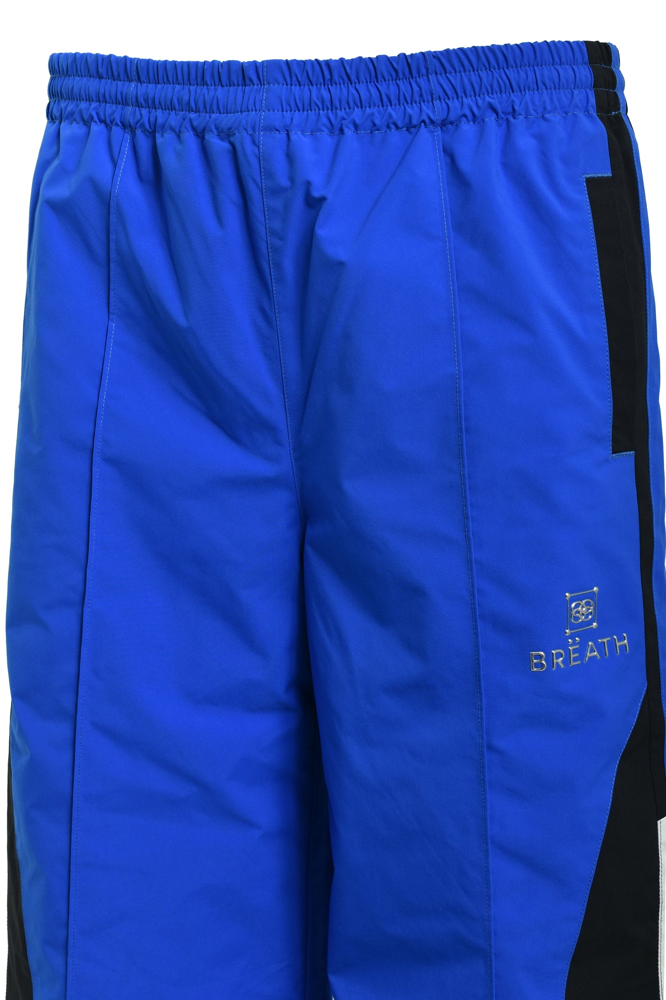 CREST LOGO WARM UP PANTS / BLUE