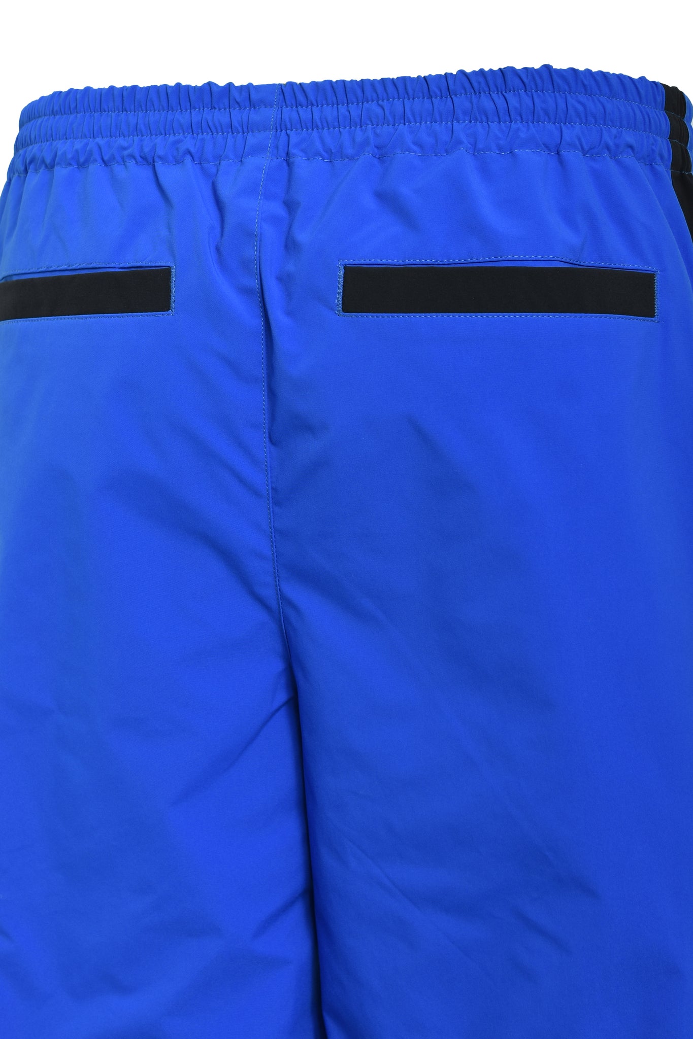 CREST LOGO WARM UP PANTS / BLUE