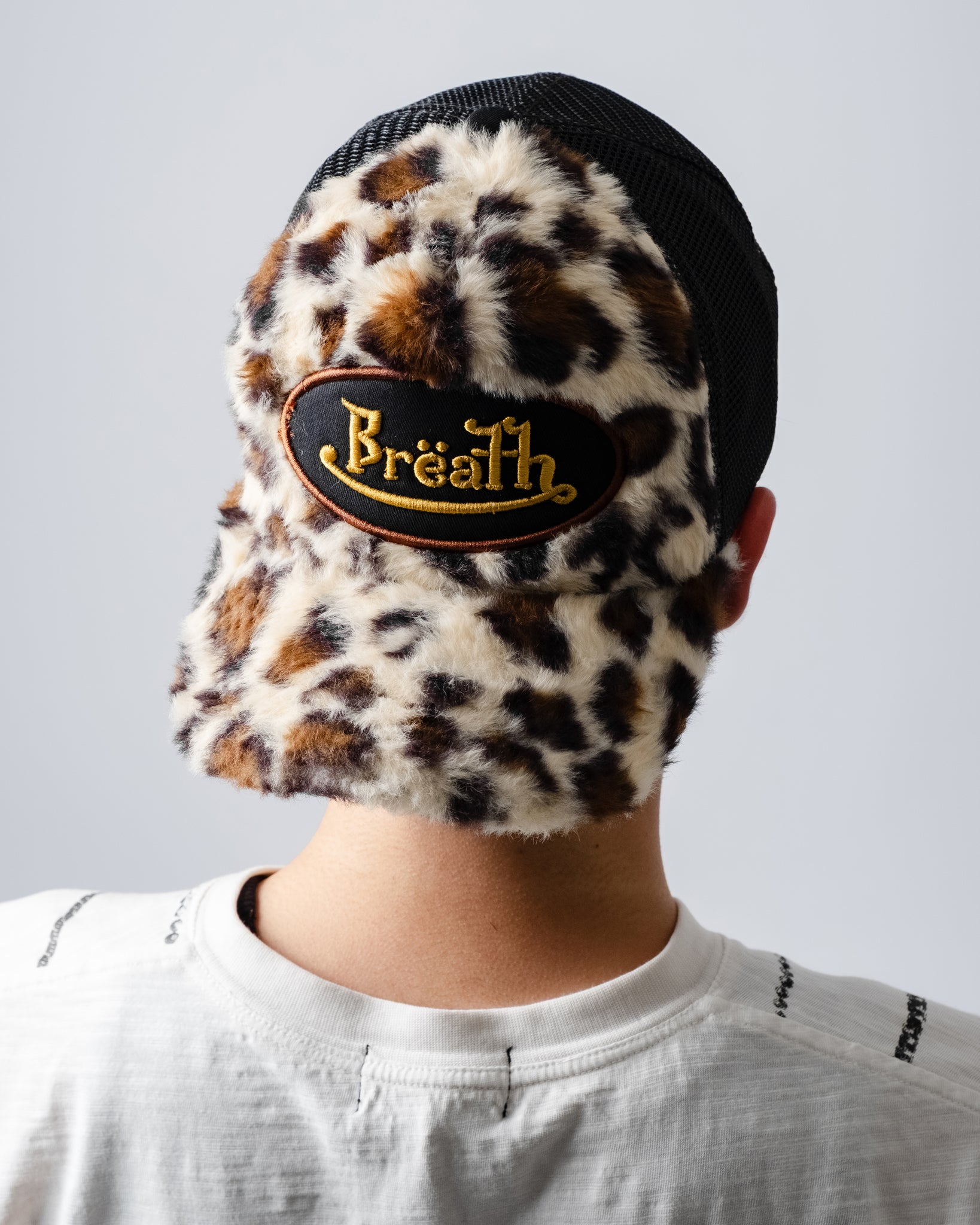 FAUX LEOPARD FUR CAP / BROWN